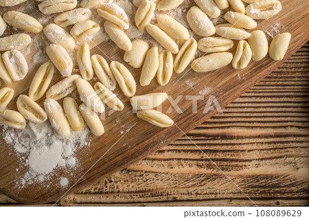 Fresh uncooked cavatelli pasta. 108089629