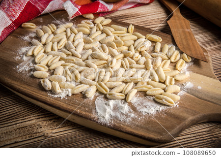 Fresh uncooked cavatelli pasta. 108089650
