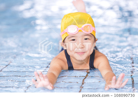 girl going to the pool girl going to the pool 108090730
