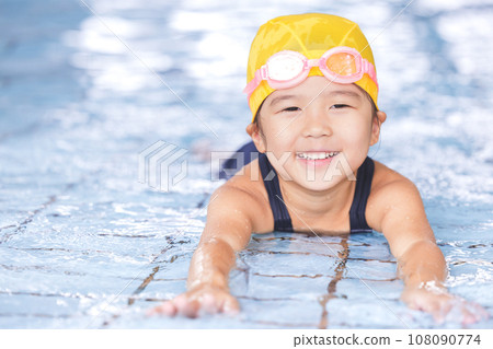 girl going to the pool girl going to the pool 108090774