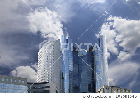 Skyscrapers La Defense (against the background of sky with clouds), commercial and business center of Paris, France Skyscrapers La Defense (against the background of sky with clouds), commercial and business center of Paris, France 108091549