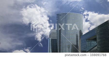 Skyscrapers La Defense (against the background of sky with clouds), commercial and business center of Paris, France Skyscrapers La Defense (against the background of sky with clouds), commercial and business center of Paris, France 108091788