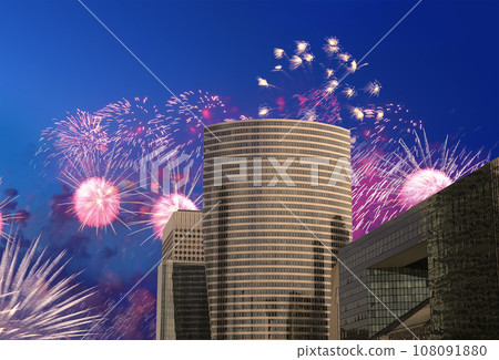 Celebratory fireworks over the Skyscrapers La Defense, commercial and business center of Paris, France 108091880