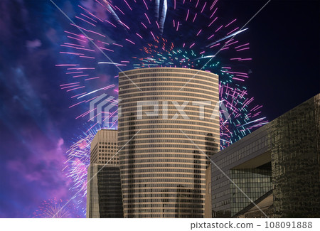 Celebratory fireworks over the Skyscrapers La Defense, commercial and business center of Paris, France Celebratory fireworks over the Skyscrapers La Defense, commercial and business center of Paris, France 108091888