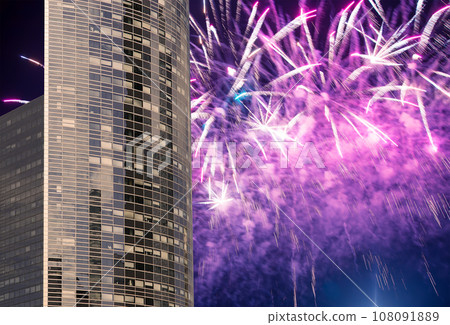 Celebratory fireworks over the Skyscrapers La Defense, commercial and business center of Paris, France Celebratory fireworks over the Skyscrapers La Defense, commercial and business center of Paris, France 108091889