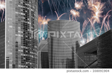 Celebratory fireworks over the Skyscrapers La Defense, commercial and business center of Paris, France Celebratory fireworks over the Skyscrapers La Defense, commercial and business center of Paris, France 108091904