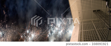 Celebratory fireworks over the La Grande Arche. La Defense, commercial and business center of Paris, France 108091921