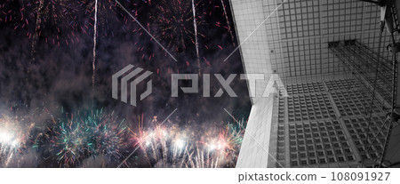 Celebratory fireworks over the La Grande Arche. La Defense, commercial and business center of Paris, France Celebratory fireworks over the La Grande Arche. La Defense, commercial and business center of Paris, France 108091927