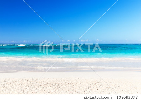 Landscape view of beautiful tropical white sand beach and turquoise sea in sunny day in Punta Cana, Dominican Republic. 108093378