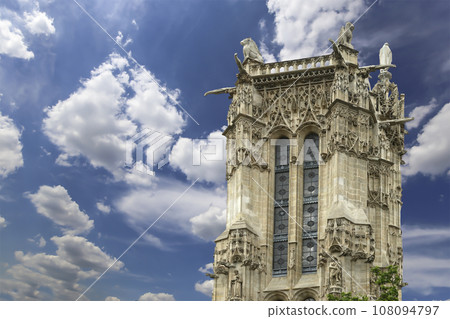 Saint-Jacques Tower (Tour Saint-Jacques) against the background of a beautiful sky with clouds. Located on Rivoli street, Paris, France. This 52 m Flamboyant Gothic tower (XVI century) Saint-Jacques Tower (Tour Saint-Jacques) against the background of a beautiful sky with clouds. Located on Rivoli street, Paris, France. This 52 m Flamboyant Gothic tower (XVI century) 108094797