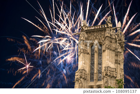 Celebratory colorful fireworks over the Saint-Jacques Tower (Tour Saint-Jacques). Located on Rivoli street, Paris, France. This 52 m Flamboyant Gothic tower (XVI century) Celebratory colorful fireworks over the Saint-Jacques Tower (Tour Saint-Jacques). Located on Rivoli street, Paris, France. This 52 m Flamboyant Gothic tower (XVI century) 108095137
