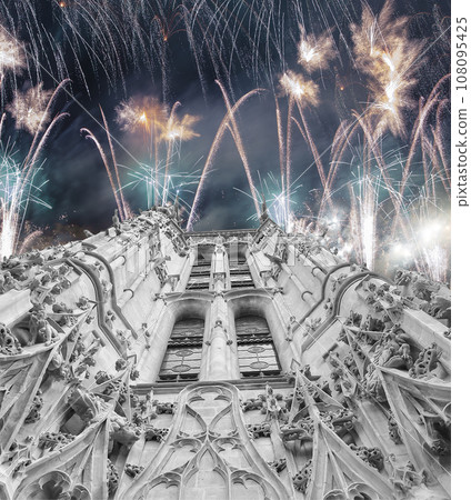 Celebratory colorful fireworks over the Saint-Jacques Tower (Tour Saint-Jacques). Located on Rivoli street, Paris, France. This 52 m Flamboyant Gothic tower (XVI century) Celebratory colorful fireworks over the Saint-Jacques Tower (Tour Saint-Jacques). Located on Rivoli street, Paris, France. This 52 m Flamboyant Gothic tower (XVI century) 108095425