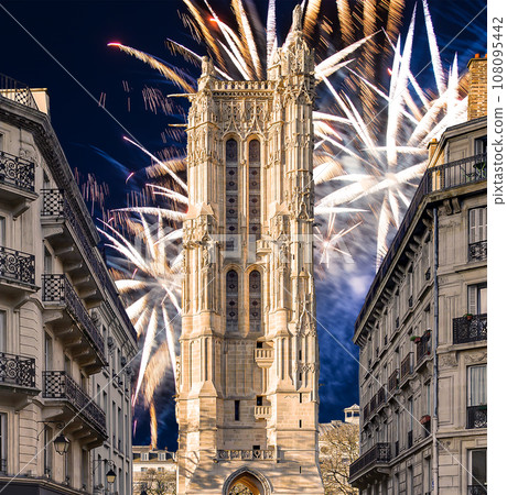 Celebratory colorful fireworks over the Saint-Jacques Tower (Tour Saint-Jacques). Located on Rivoli street, Paris, France. This 52 m Flamboyant Gothic tower (XVI century) Celebratory colorful fireworks over the Saint-Jacques Tower (Tour Saint-Jacques). Located on Rivoli street, Paris, France. This 52 m Flamboyant Gothic tower (XVI century) 108095442