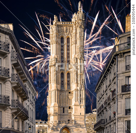 Celebratory colorful fireworks over the Saint-Jacques Tower (Tour Saint-Jacques). Located on Rivoli street, Paris, France. This 52 m Flamboyant Gothic tower (XVI century) Celebratory colorful fireworks over the Saint-Jacques Tower (Tour Saint-Jacques). Located on Rivoli street, Paris, France. This 52 m Flamboyant Gothic tower (XVI century) 108095444