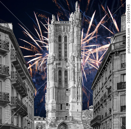 Celebratory colorful fireworks over the Saint-Jacques Tower (Tour Saint-Jacques). Located on Rivoli street, Paris, France. This 52 m Flamboyant Gothic tower (XVI century) Celebratory colorful fireworks over the Saint-Jacques Tower (Tour Saint-Jacques). Located on Rivoli street, Paris, France. This 52 m Flamboyant Gothic tower (XVI century) 108095445