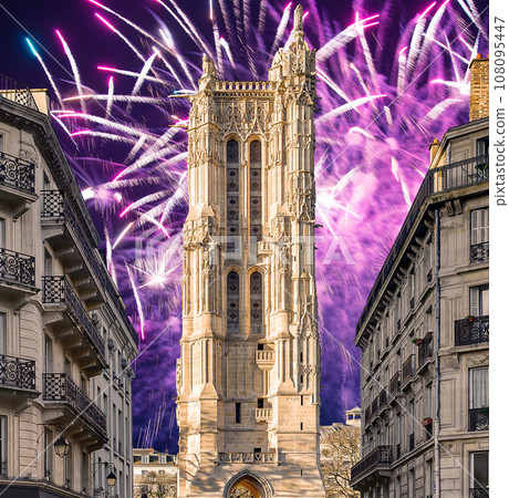 Celebratory colorful fireworks over the Saint-Jacques Tower (Tour Saint-Jacques). Located on Rivoli street, Paris, France. This 52 m Flamboyant Gothic tower (XVI century) Celebratory colorful fireworks over the Saint-Jacques Tower (Tour Saint-Jacques). Located on Rivoli street, Paris, France. This 52 m Flamboyant Gothic tower (XVI century) 108095447