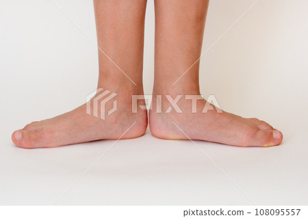 Cropped barefoot child legs  108095557
