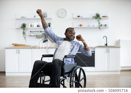 Young male in casual clothes spending pastime indoors. 108095716