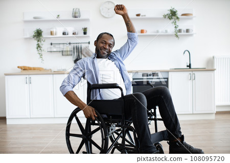 Young male in casual clothes spending pastime indoors. 108095720