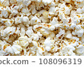 classic salty popcorn texture background, movie food 108096319
