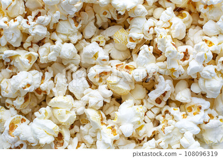 classic salty popcorn texture background, movie food classic salty popcorn texture background, movie food 108096319