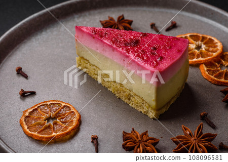Delicious sweet cheesecake cake with mascarpone cheese, raspberries and jam 108096581