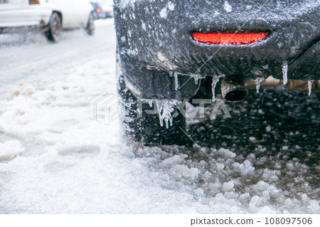 car covered with ice after snowstorm car covered with ice after snowstorm 108097506