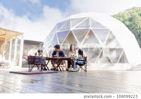 Glamping family breakfast scene 108099223