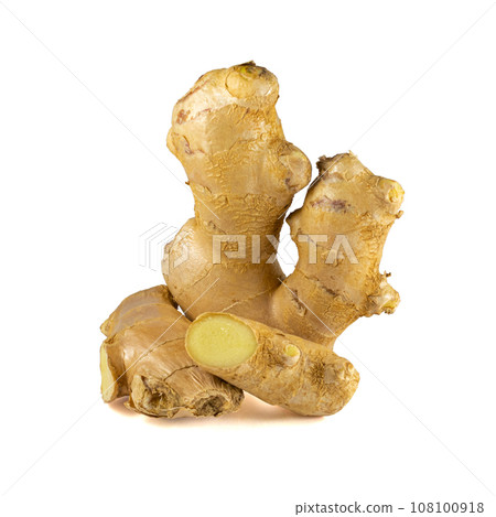 Fresh ginger rhizome with sliced isolated on white background.  108100918
