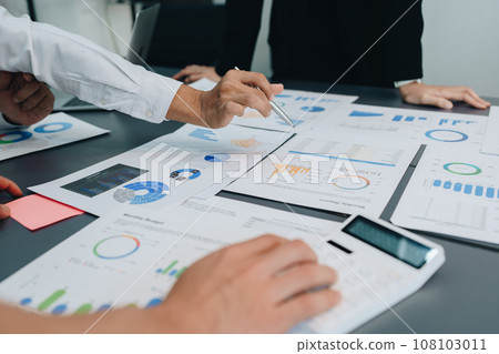 Asian business advisor meeting to analyze and discuss the situation on the financial report in the meeting room.Investment Consultant, Financial , teamwork ,brainstorming ,startup and accounting. 108103011