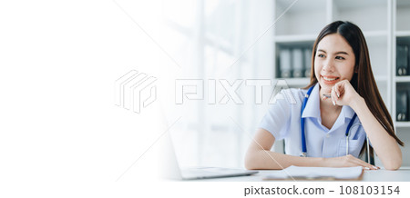 The doctor is checking the patient's history before giving treatment. 108103154