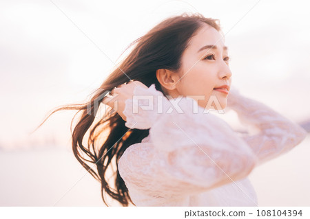 Beauty image with sunset background Beauty image with sunset background 108104394