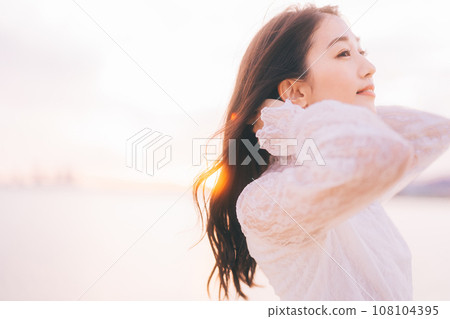 Beauty image with sunset background 108104395