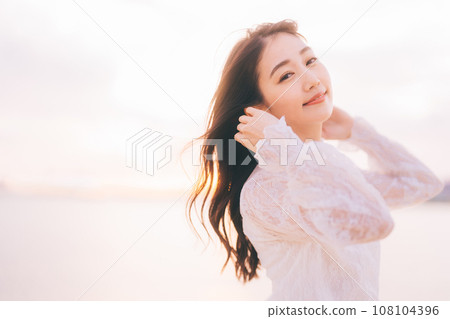 Beauty image with sunset background 108104396