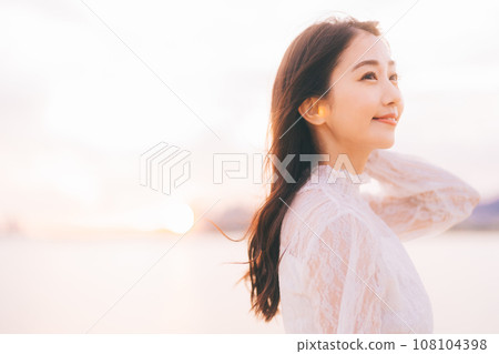 Beauty image with sunset background Beauty image with sunset background 108104398