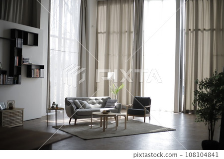white living room with black and white walls white living room with black and white walls 108104841