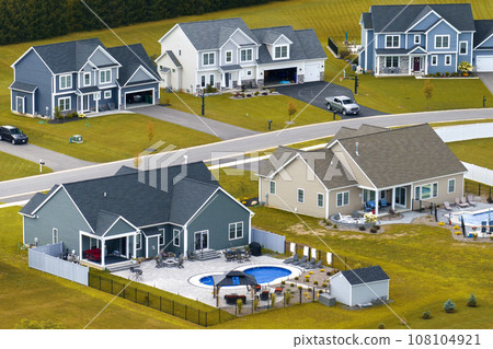 View from above of residential houses in living area in Rochester, NY. American dream homes as example of real estate development in US suburbs 108104921