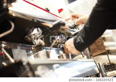 espresso shot from coffee machine 108105423