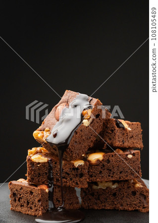Brownie with chocolate syrup 108105489