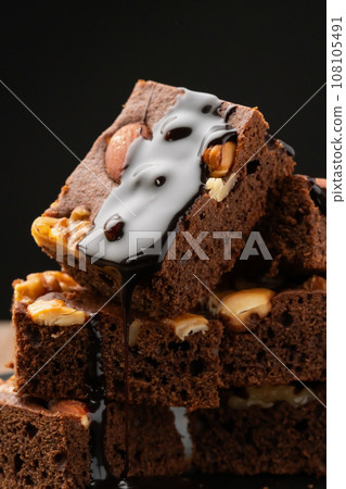 Brownie with chocolate syrup Brownie with chocolate syrup 108105491