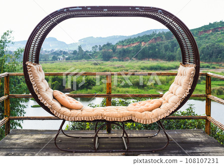 Double bed with cozy pillows against vietnamese landscape of Da Lat city Double bed with cozy pillows against vietnamese landscape of Da Lat city 108107231