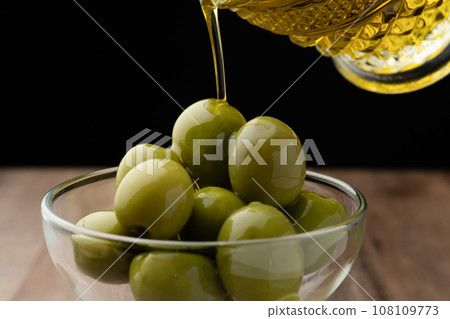 Olive oil drizzled 108109773