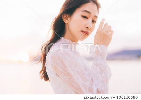 Beauty image with sunset background Beauty image with sunset background 108110580