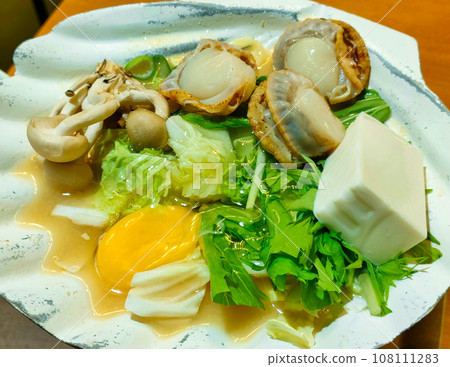 Aomori's local cuisine - miso-grilled scallops 108111283