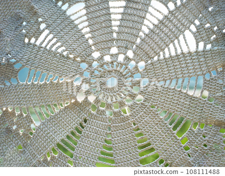 Various knots of macrame technique made of white threads 108111488