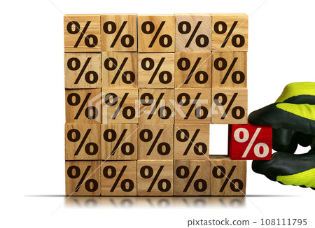 Gloved Hand Chooses a Wooden Block with Percentage Sign 108111795