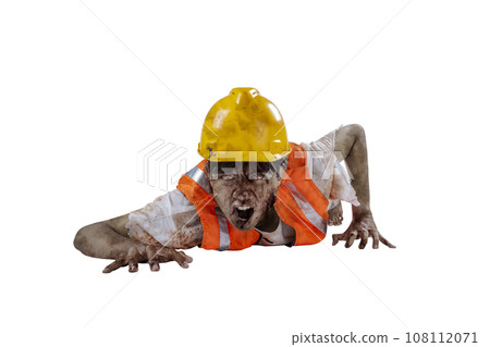 A scary construction worker zombie with blood and wounds on his body crawling 108112071