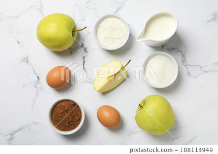 The ingredients are laid out on the table for preparing autumn pastries. The ingredients are laid out on the table for preparing autumn pastries. 108113949