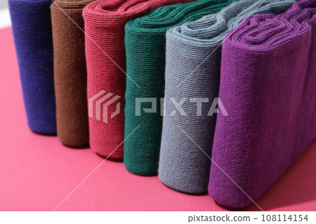 Casual clothes and wearing concept - socks, clothes for foot 108114154