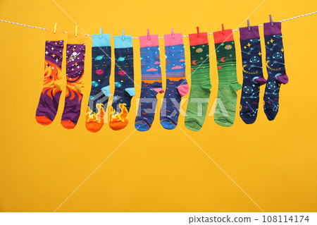 Casual clothes and wearing concept - socks, clothes for foot Casual clothes and wearing concept - socks, clothes for foot 108114174
